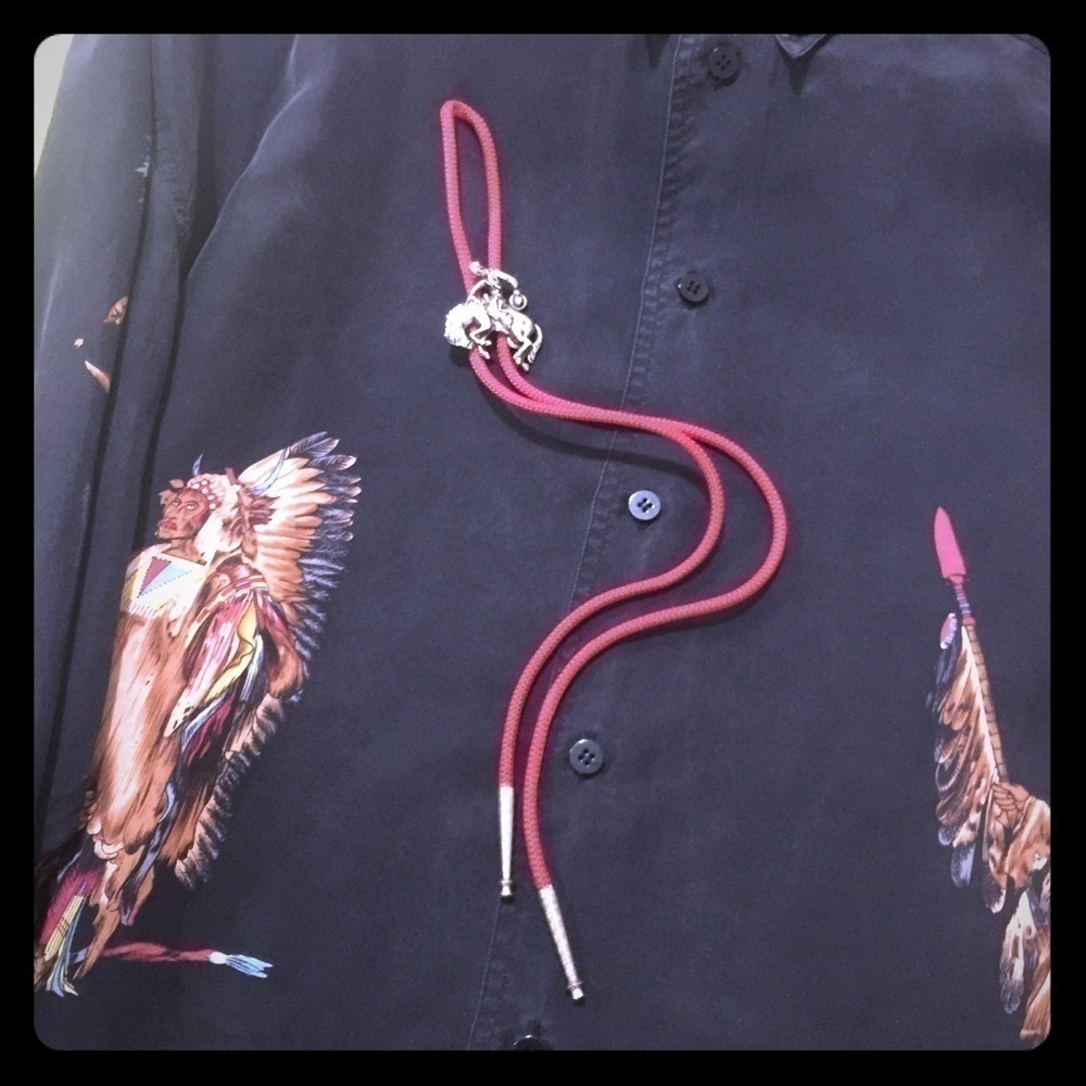 Bolo tie with silver Bronco Rider on Bucking Horse